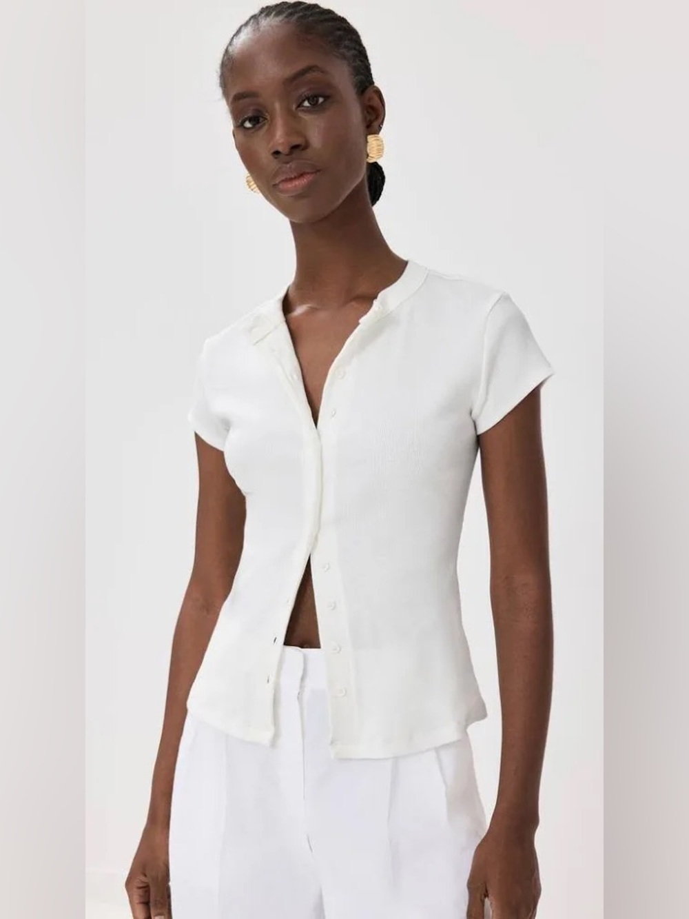 Reformation Raelynn Knit Top in the colorway Bleach (White). Size Xsmall